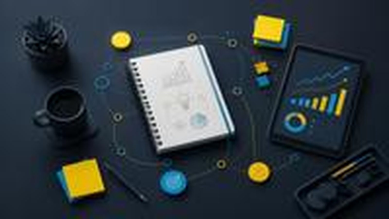 A business owner's desk with a notebook, sticky notes and growth charts